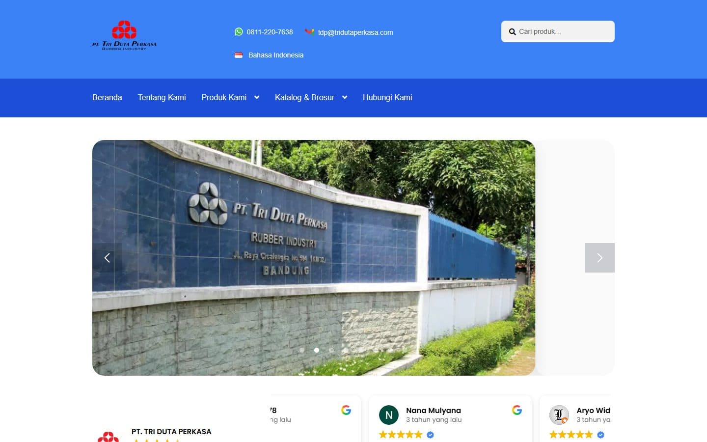 PT. Tri Duta Perkasa homepage with a photo of the rubber factory in Bandung